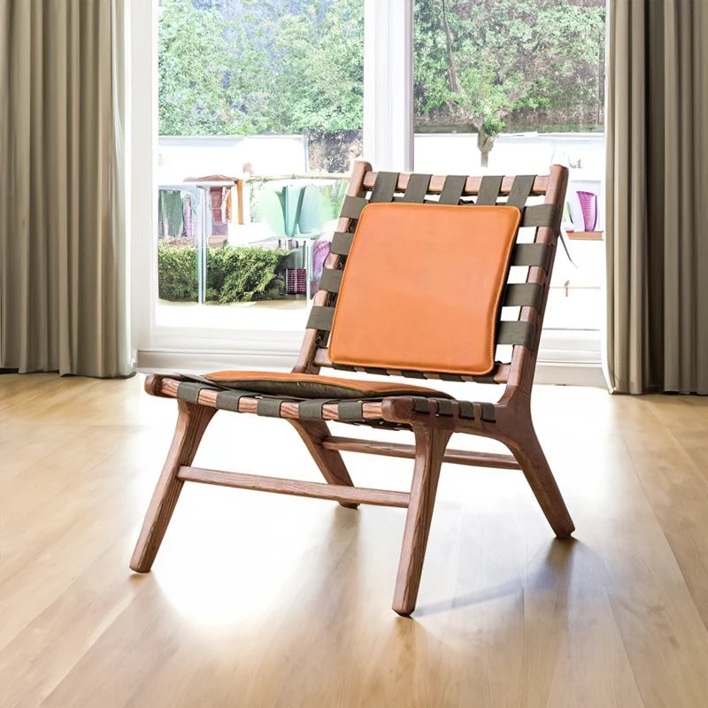 Brown leather accent chair: Slouched and ready to lounge