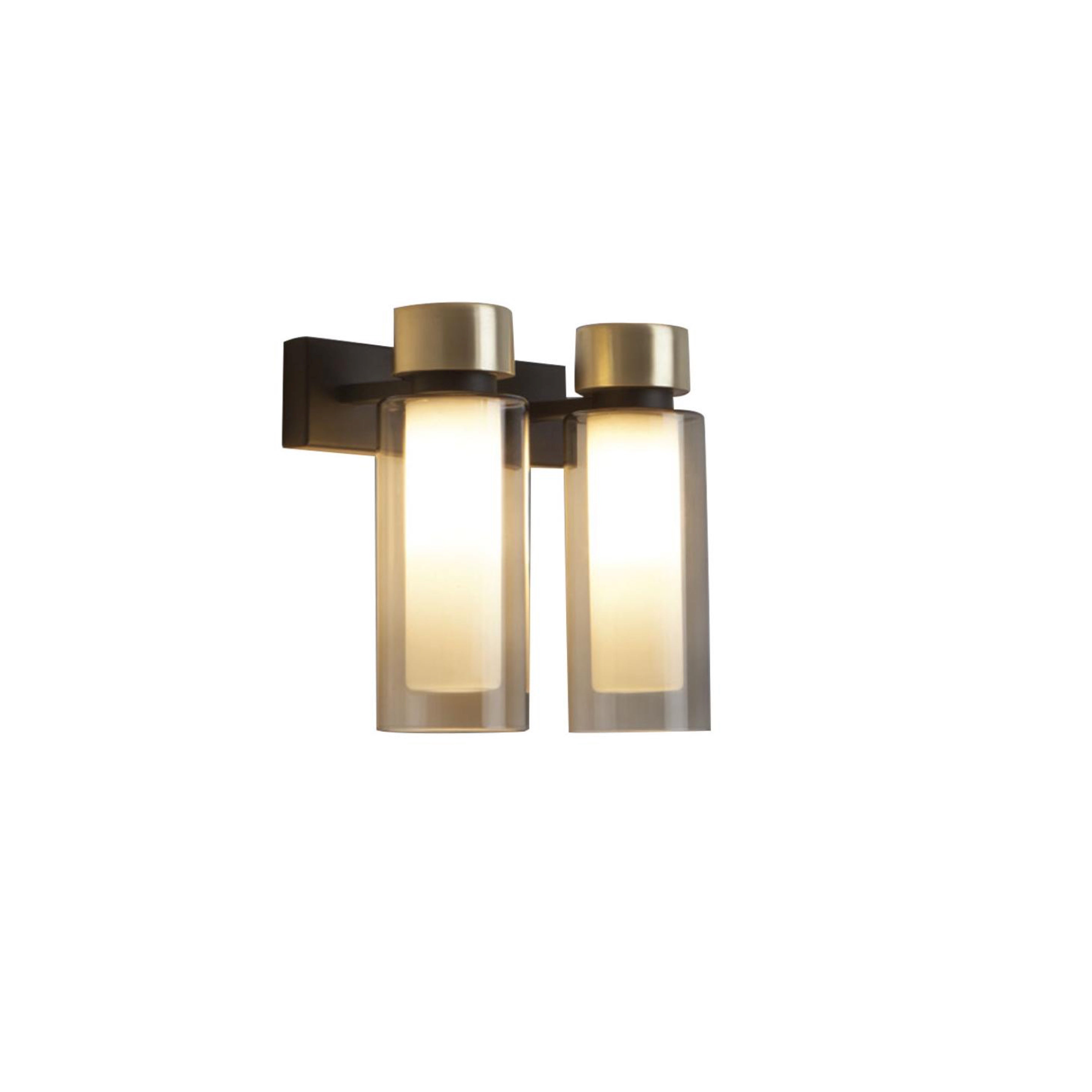 Our Saunders style lamps with brushed brass details and smoked double-wall cylindrical diffusers provides a fascinating and harmonious light diffusion.